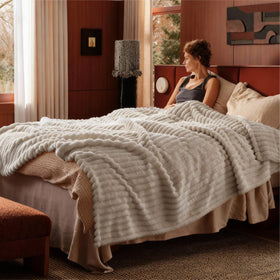 Bedsure GentleSoft beige throw complements calm bedroom decor