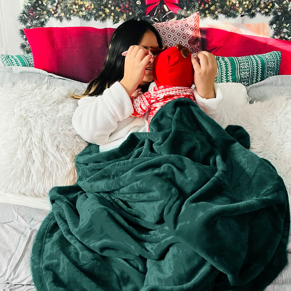 Bedsure GentleSoft emerald blanket draped on king bed for cozy layering.