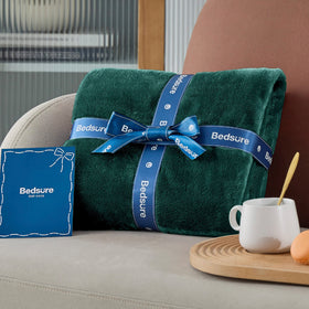 Bedsure GentleSoft emerald blanket used during camping for lightweight warmth.