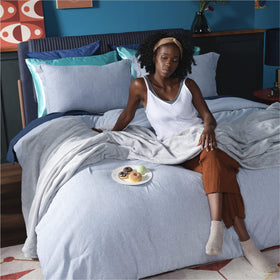 Bedsure GentleSoft folded blanket in light grey for storage