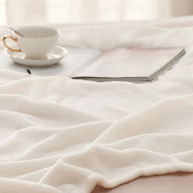 Bedsure GentleSoft blanket in living room as cozy decor accent.