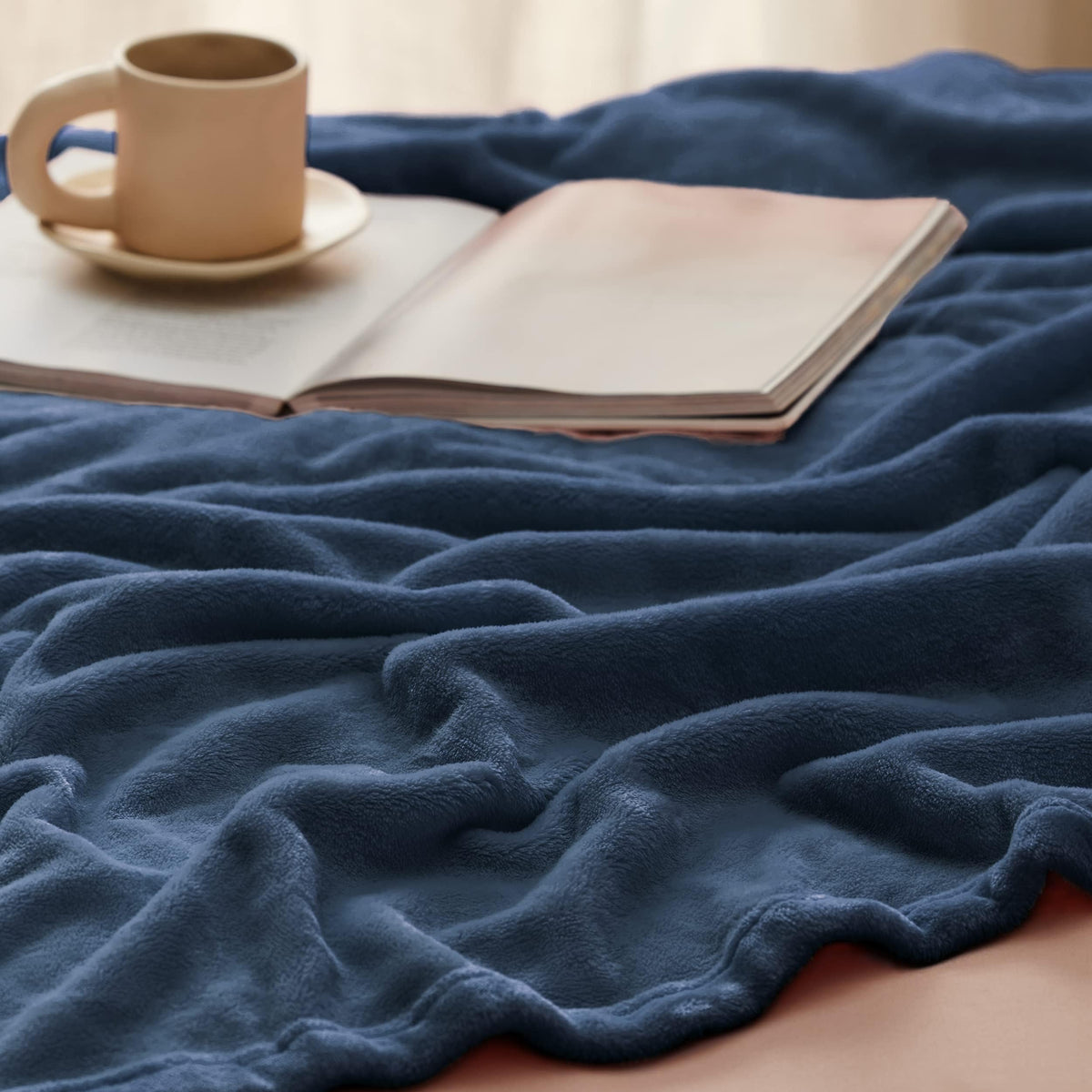Corner-draped Bedsure GentleSoft blanket in mineral blue as decor and warmth