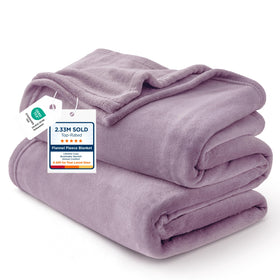 Bedsure GentleSoft fleece blanket in fog purple folded for cozy warmth and simple comfort.