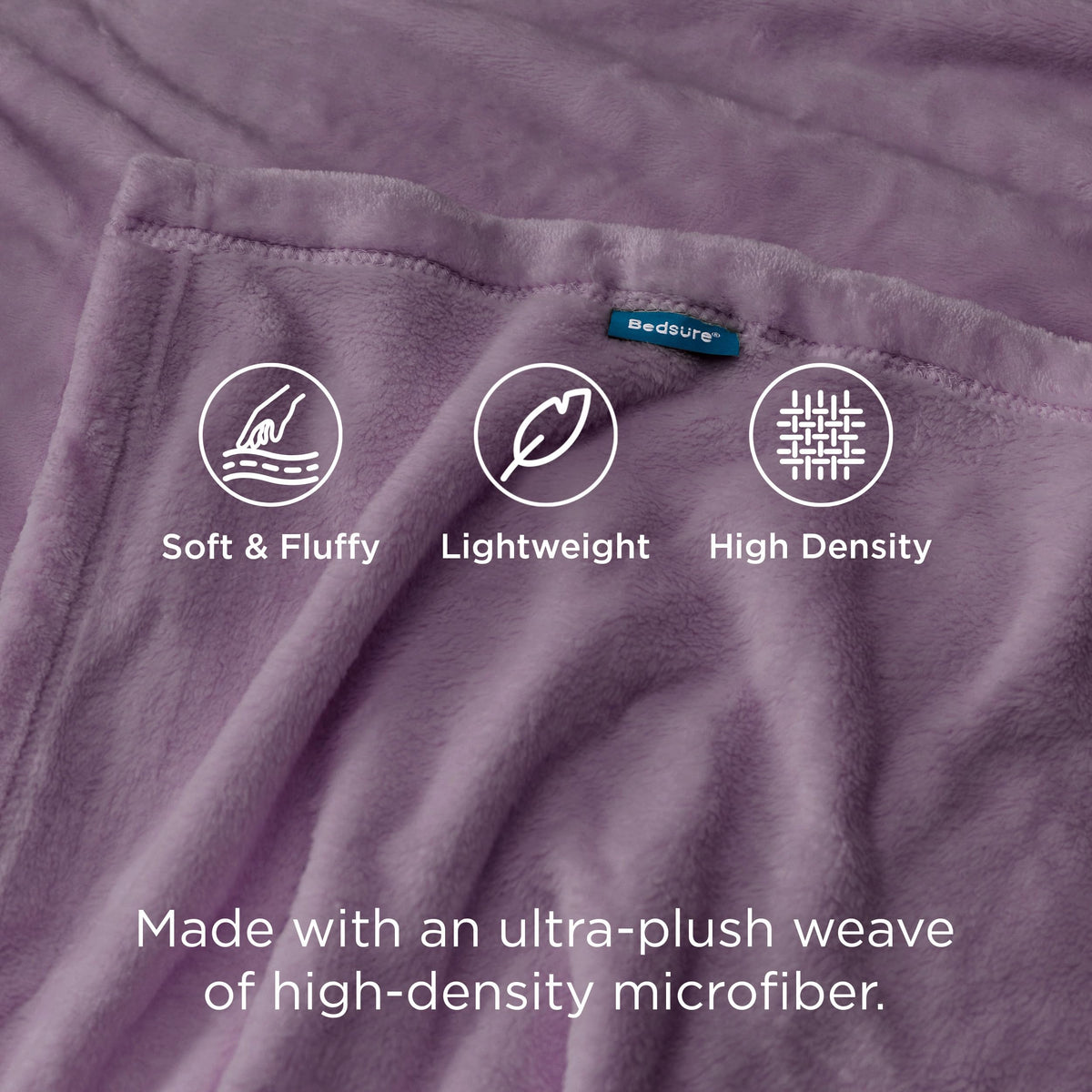 Bedsure GentleSoft fog purple blanket draped on bed adds inviting color and texture.