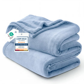 Bedsure GentleSoft fleece blanket in light blue on bed showing soft texture and coziness