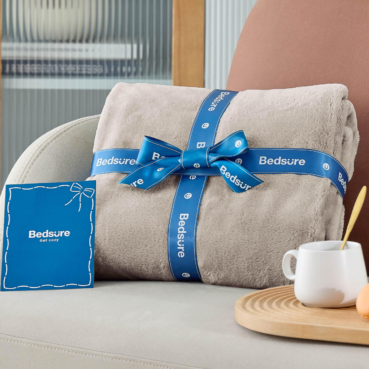 Bedsure GentleSoft fleece blanket as decor on a couch, inviting lounging.
