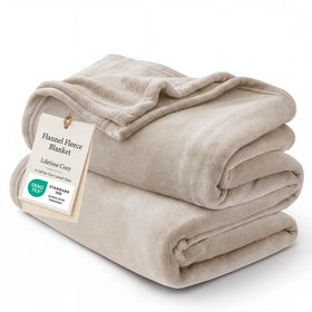 Bedsure GentleSoft fleece blanket in Oxford Tan, draped on a bed for year-round coziness.