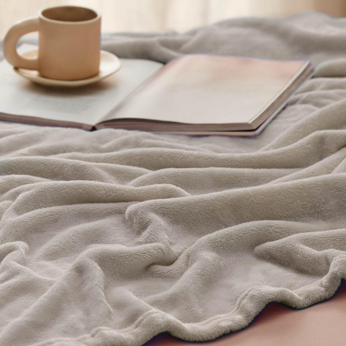 Bedsure GentleSoft fleece blanket with a pet, illustrating cozy cuddle moments.