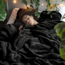 Bedsure GentleSoft blanket draped over sofa, lightweight comfort for lounging.