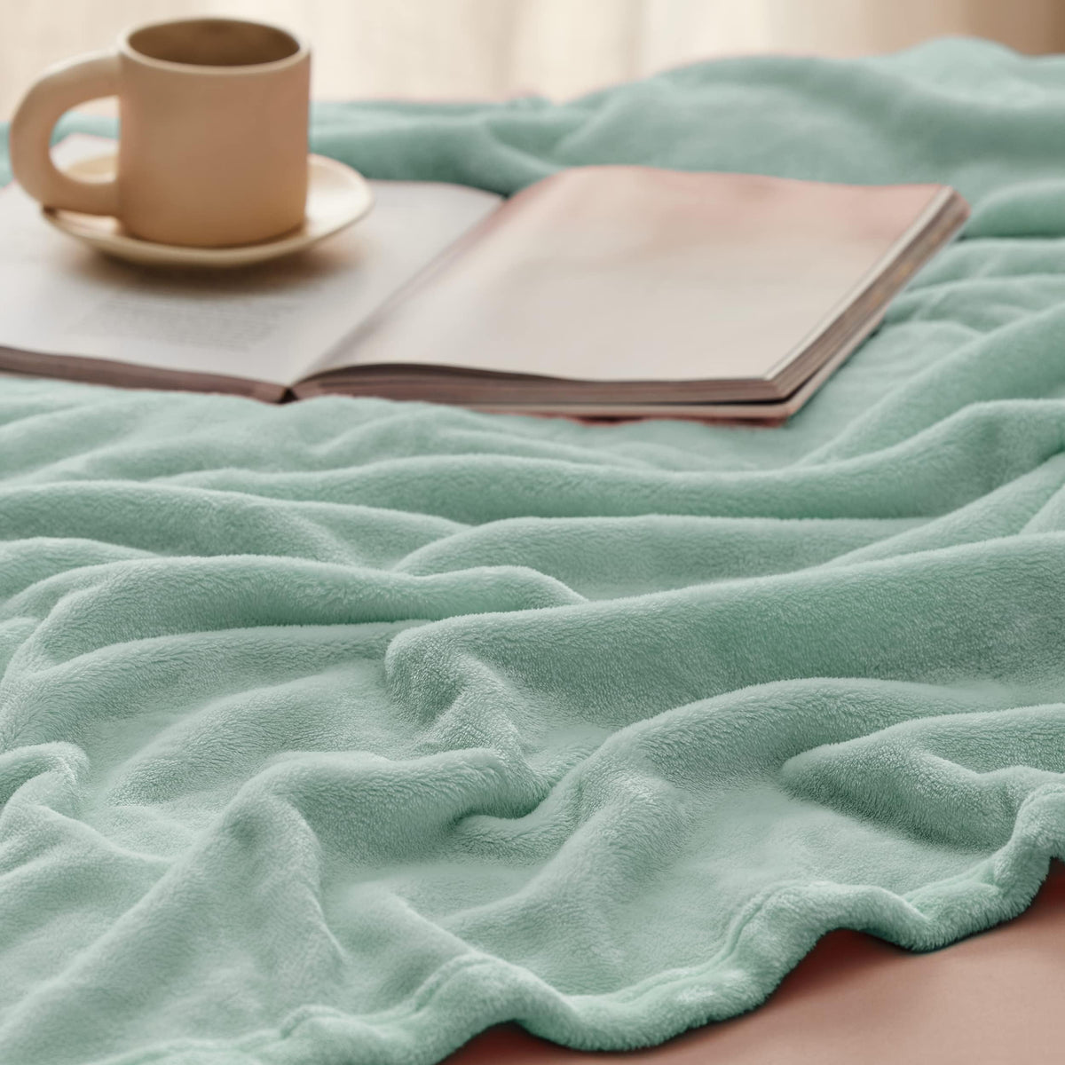 Bedsure GentleSoft fleece blanket on sofa for family warmth during evenings.