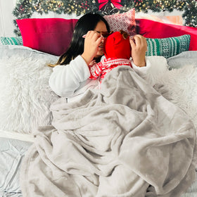 Bedsure GentleSoft fleece blanket compact travel pouch ready for trips.