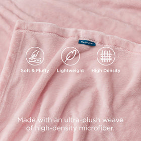 Bedsure GentleSoft fleece blanket in a stylish bedroom setup for coziness