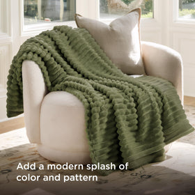 Bedsure GentleSoft fleece twin blanket on couch for movie night snuggle