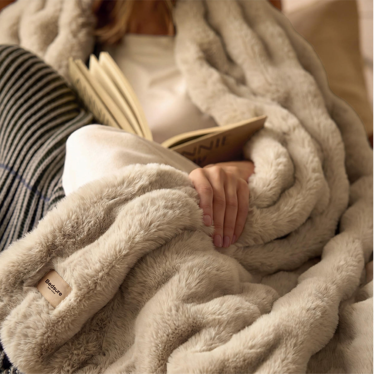 Bedsure GentleSoft draped over sofa invites relaxed lounging and comfort.
