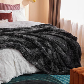 Bedsure GentleSoft fluffy blanket bedside view ready for nighttime routine.