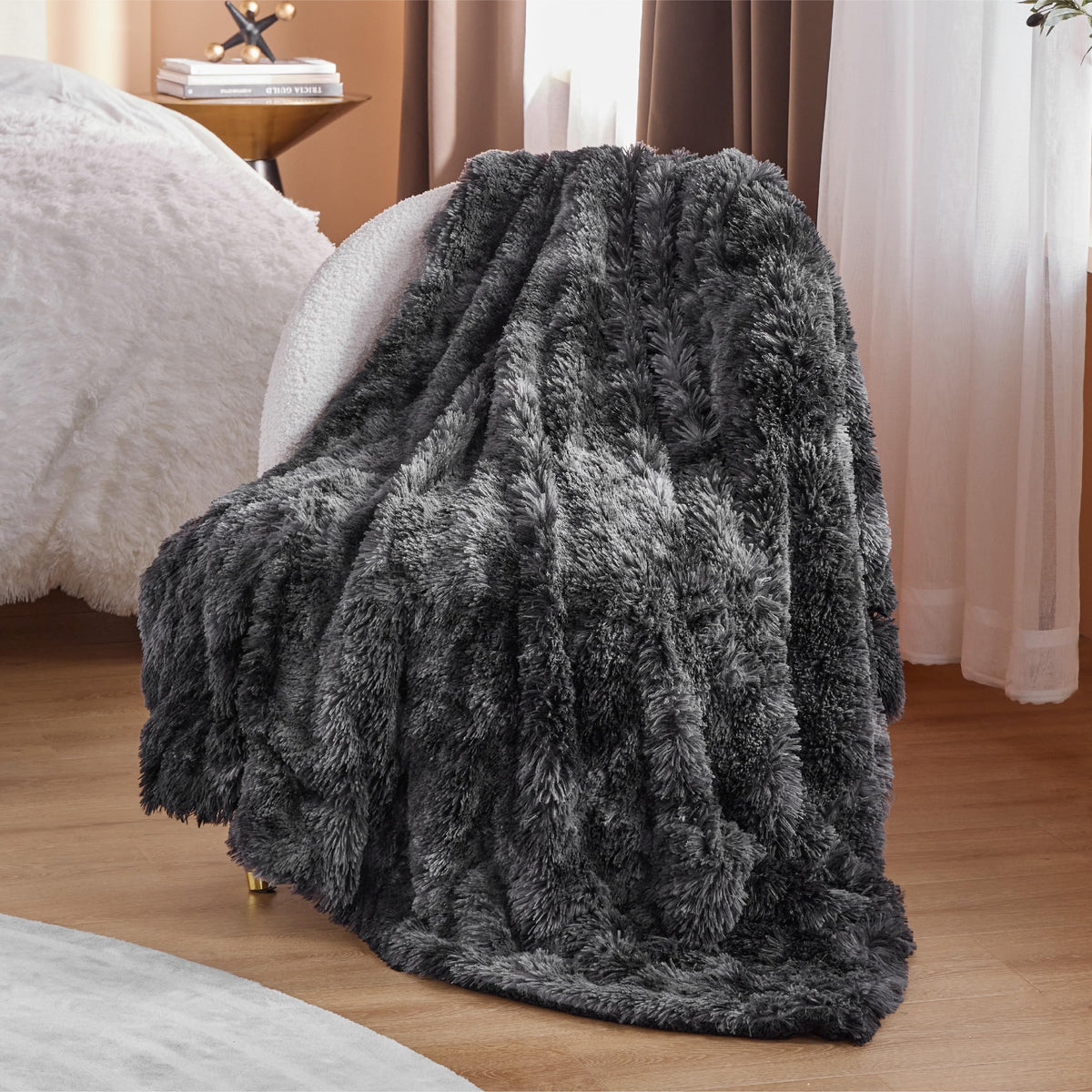 Bedsure GentleSoft fluffy blanket on bed adds warmth and style to bedding.