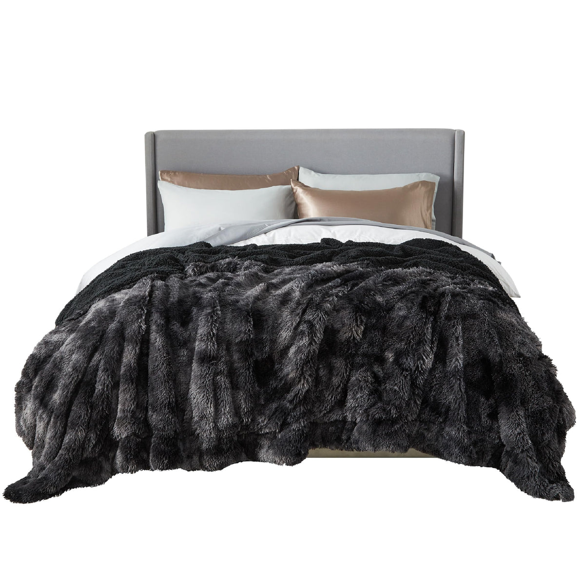 Bedsure GentleSoft fluffy tie-dye blanket on queen bed for cozy warmth.