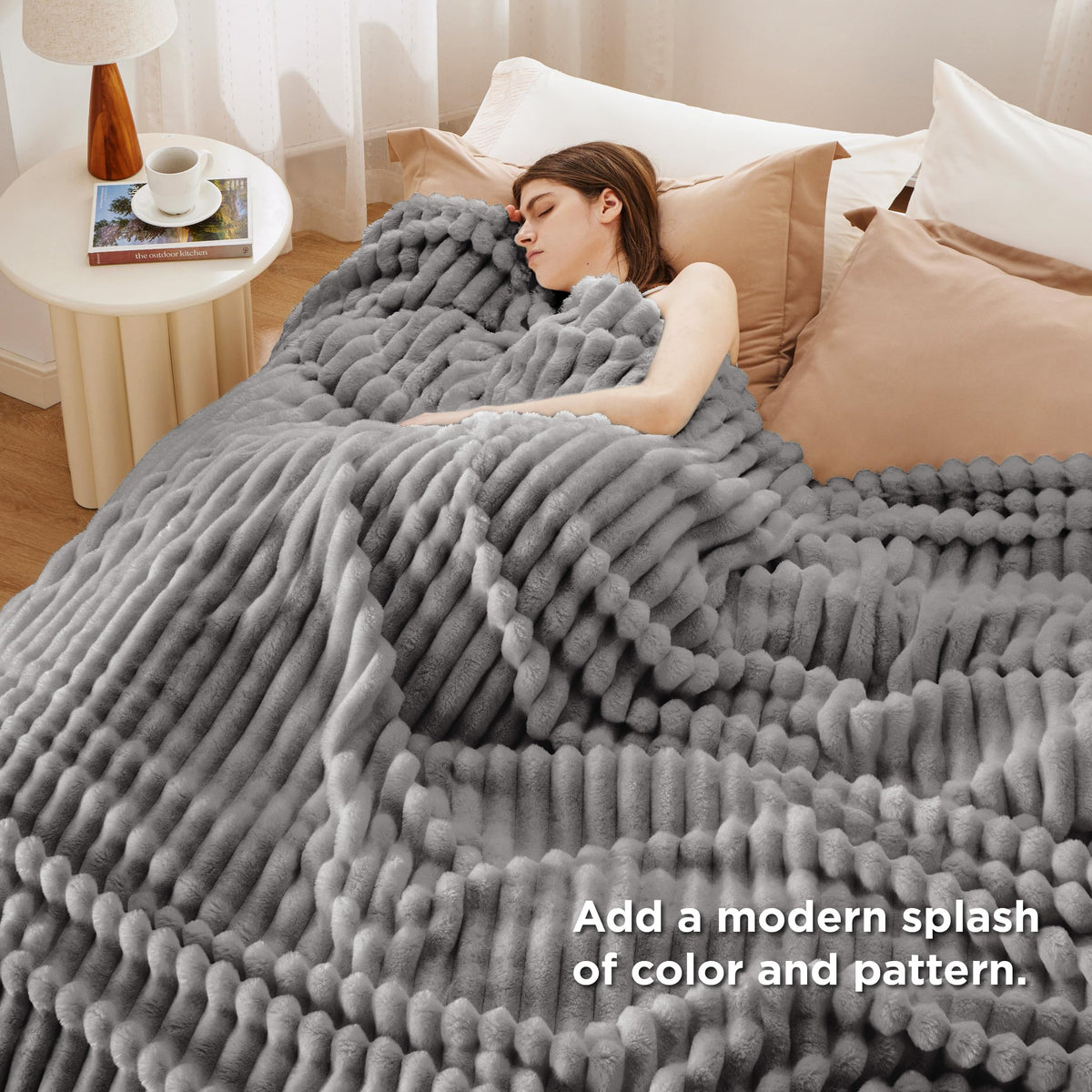 Bedsure GentleSoft Frost Gray blanket draped on bed for inviting softness