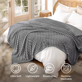 Bedsure GentleSoft Frost Gray blanket at bedside creates a soft retreat for calm mornings.