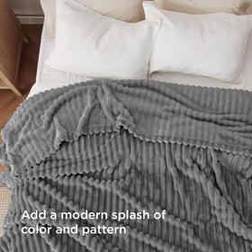 Bedsure GentleSoft Frost Gray blanket folded to show 90x90 size and plush warmth.
