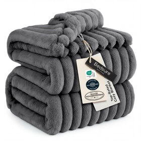 Bedsure GentleSoft Frost Gray blanket on couch for cozy relaxation and everyday warmth.