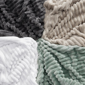 Bedsure GentleSoft king throw in a bedroom setting for snuggly warmth.