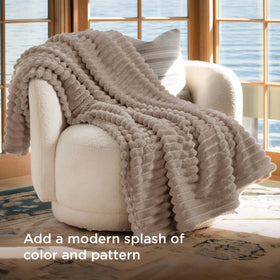 Bedsure light brown fleece blanket with striped pattern enhances bedroom decor