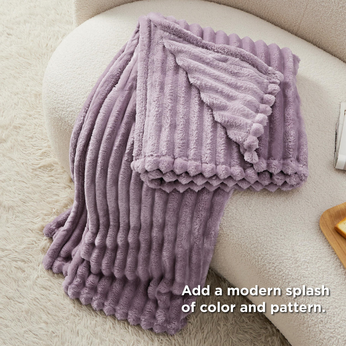 Bedsure GentleSoft light purple throw packaging presents a gift-ready look.