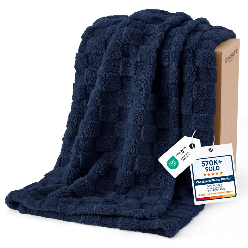Bedsure GentleSoft navy blue throw on couch offers cozy evenings.