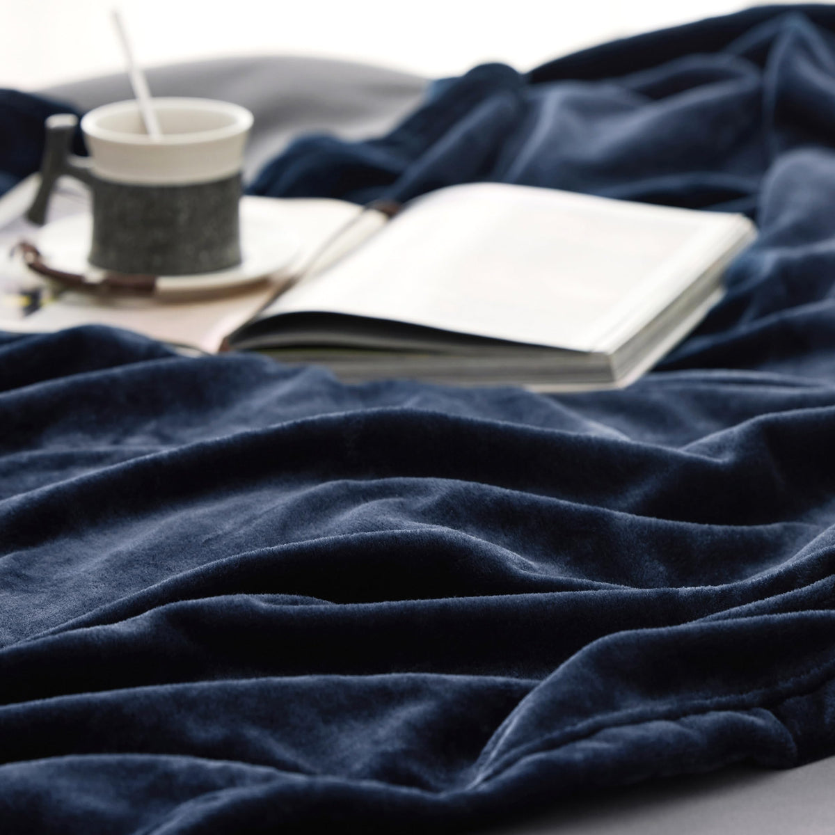 Bedsure GentleSoft navy fleece blanket in festive gift wrap, ready for gifting