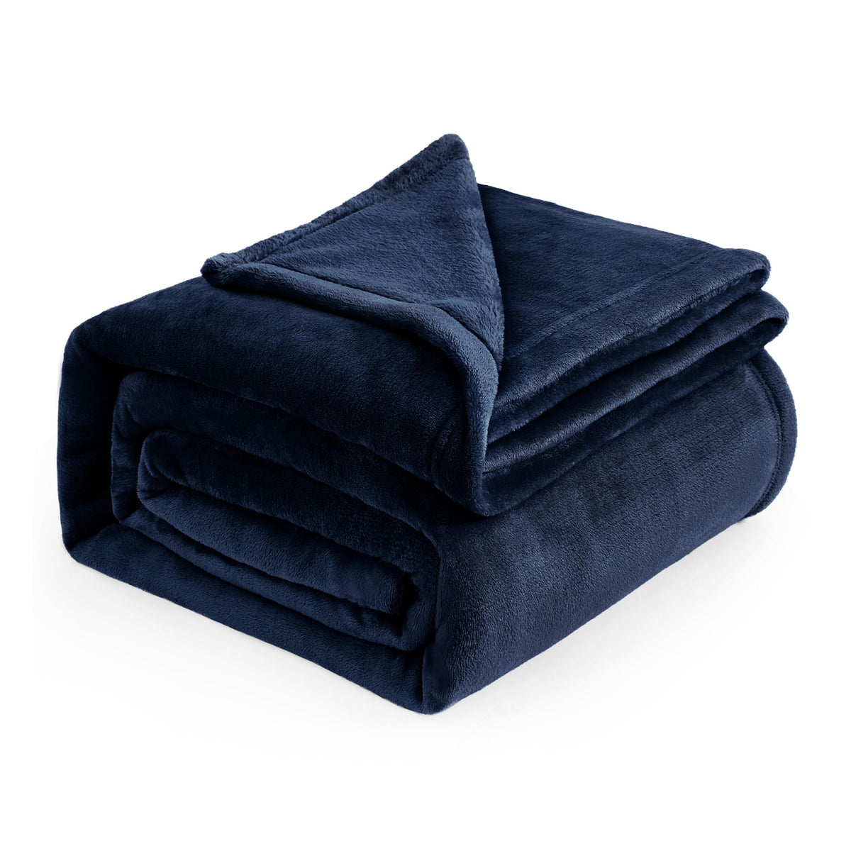 Bedsure GentleSoft navy fleece blanket on bed showing smooth fabric and warm feel