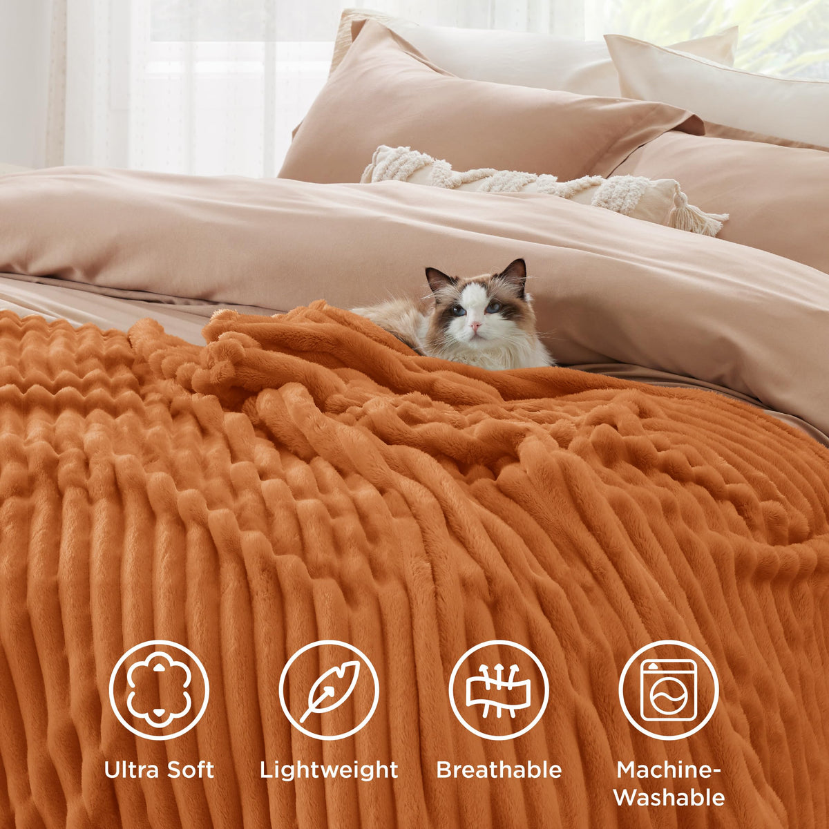 Bedsure GentleSoft orange fall throw blanket bed snuggle for relaxed evenings.