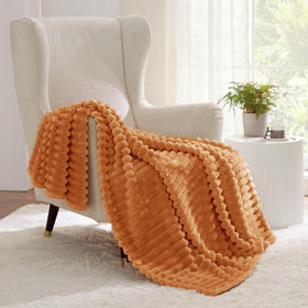 Bedsure GentleSoft orange fall throw blanket machine washable for easy care.