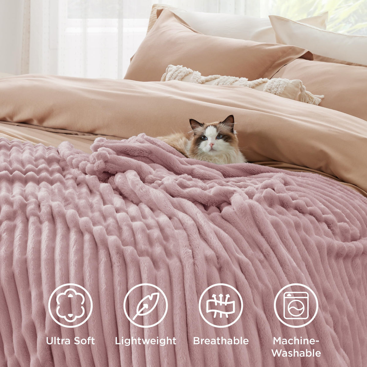 Bedsure GentleSoft pink fleece blanket on chair demonstrates lightweight warmth