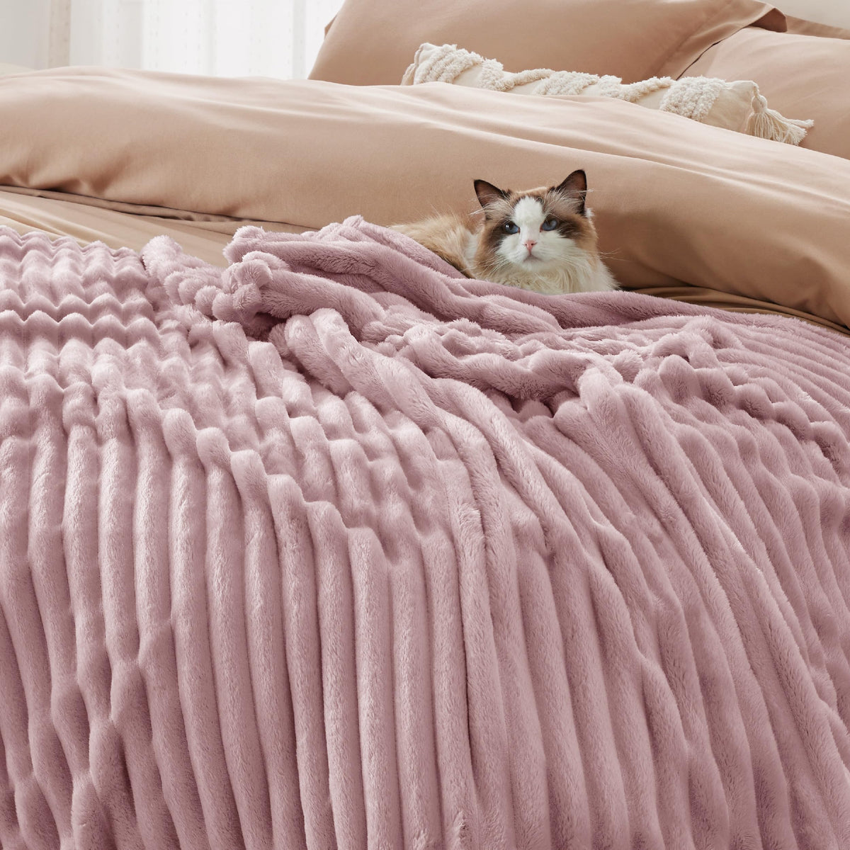 Bedsure GentleSoft pink fleece blanket machine washable for easy care