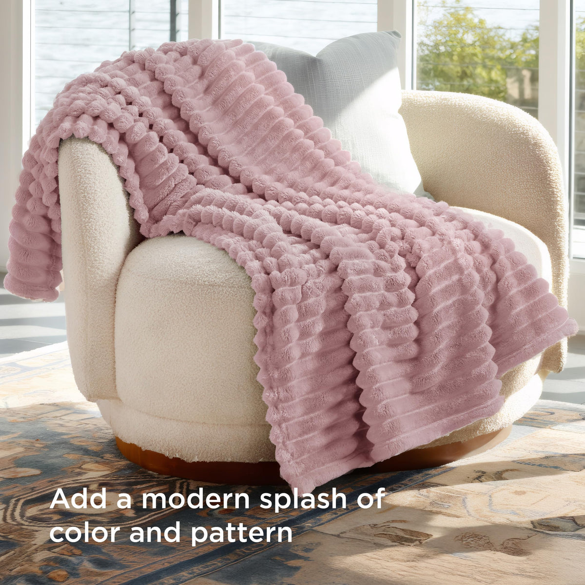 Bedsure GentleSoft pink blanket with striped pattern complements modern decor