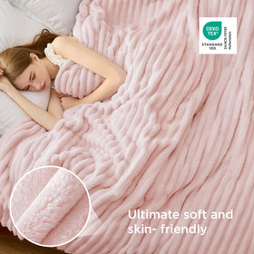 Bedsure GentleSoft Pink Throw draped over a chair demonstrates versatile comfort for lounging.