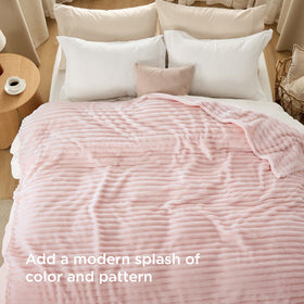 Bedsure GentleSoft Pink Throw stripe pattern complements modern decor with understated elegance.