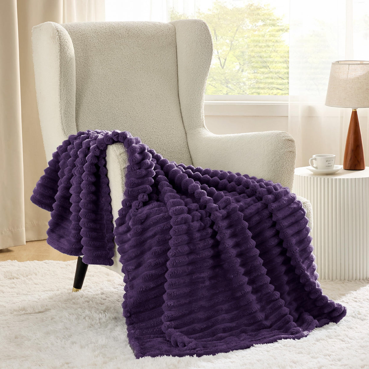 Bedsure GentleSoft purple throw rolled for compact cozier storage