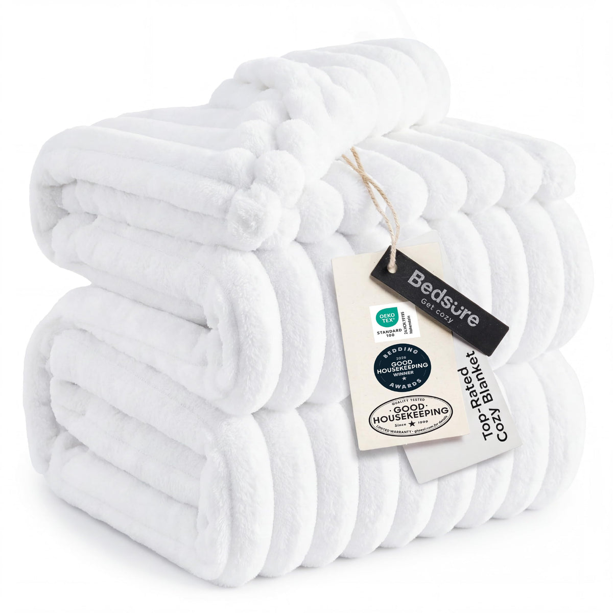 Bedsure GentleSoft queen blanket draped on a couch for cozy movie nights.