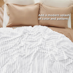 Bedsure GentleSoft blanket with visible stitching emphasizing durable seams.