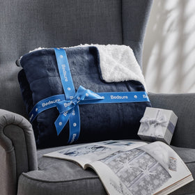 Bedsure GentleSoft Sherpa throw added to living room decor for warmth.