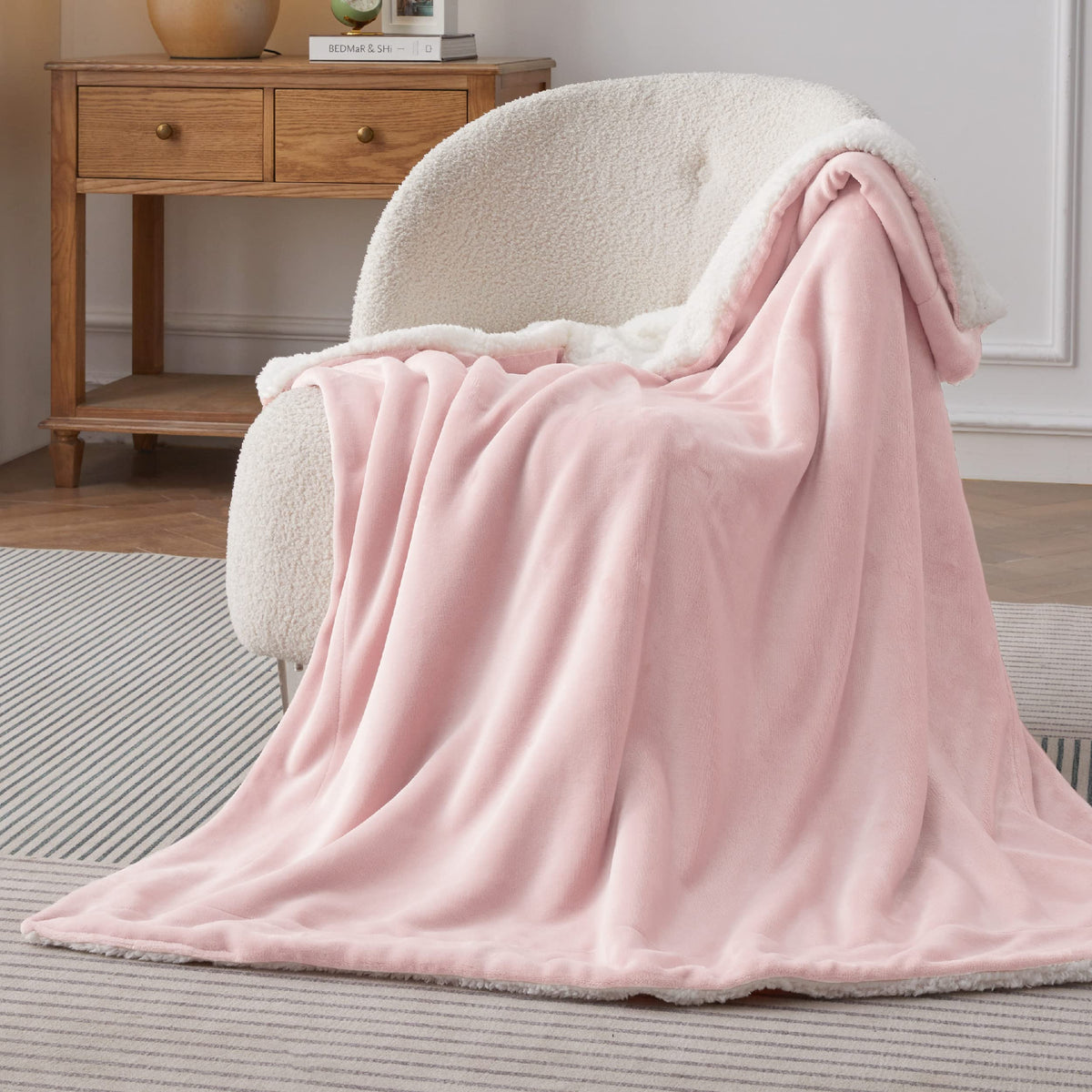 Bedsure GentleSoft Sherpa throw shown folded on couch creates inviting decor.