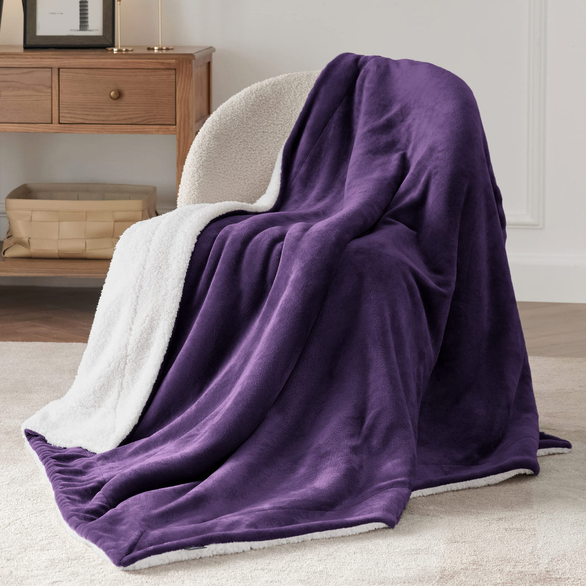 Bedsure GentleSoft sherpa fleece throw on a couch for cozy family lounging