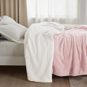 Bedsure GentleSoft Sherpa throw is pet-friendly for cozy moments with pets.