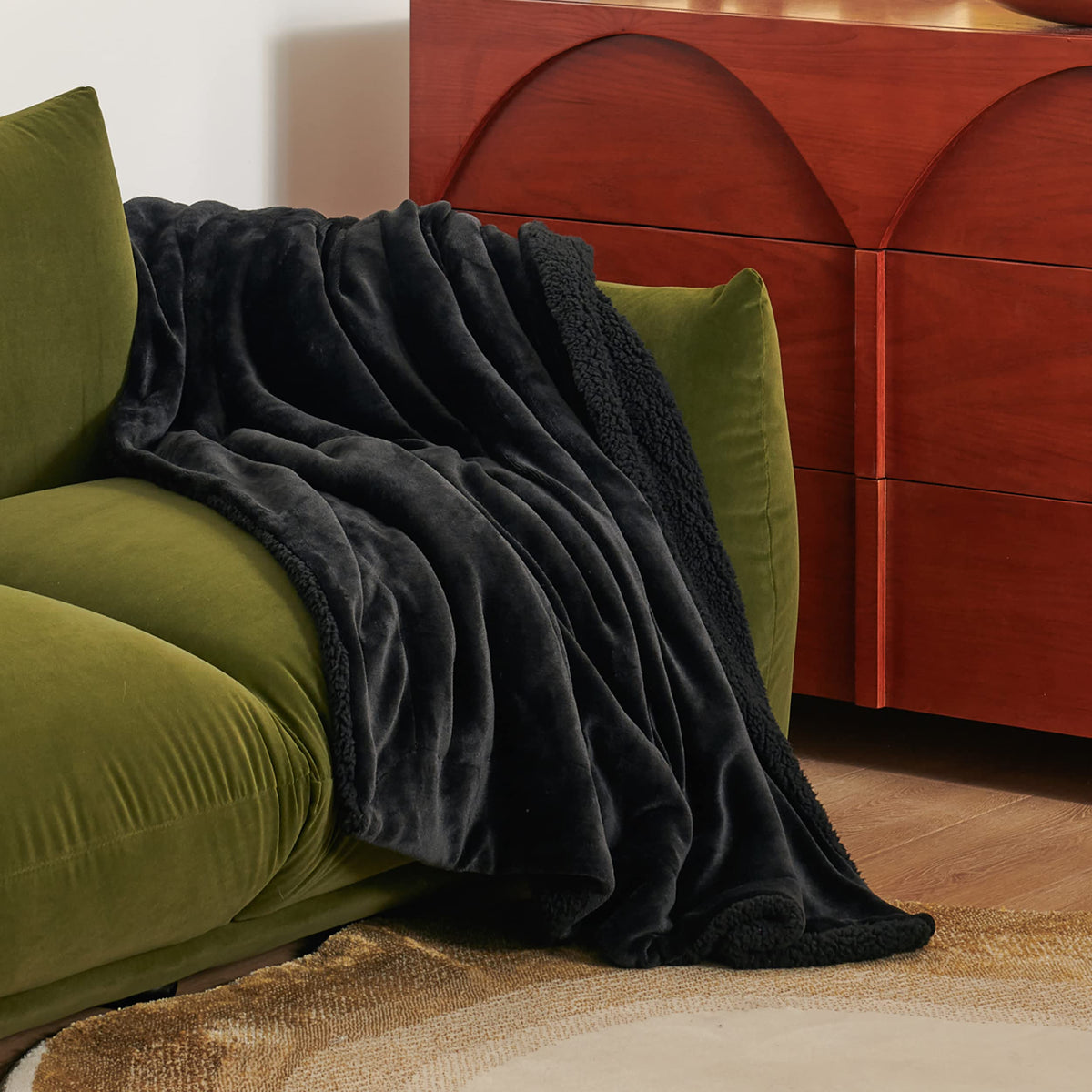 Bedsure GentleSoft Sherpa Throw side drape demonstrates stylish warmth for seating.
