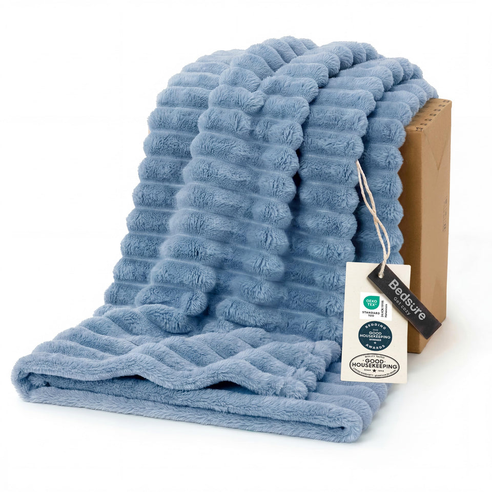 Bedsure GentleSoft Throw Blanket front view on blue fabric for couch lounging.