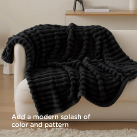Bedsure GentleSoft Twin Blanket in black color complements modern bedroom decor.