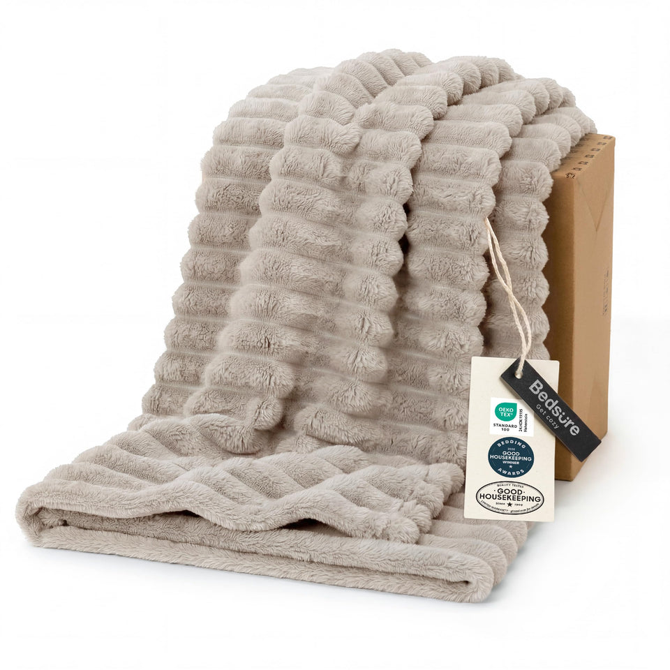 Bedsure GentleSoft twin XL blanket draped over a sofa delivers cozy warmth for everyday lounging.