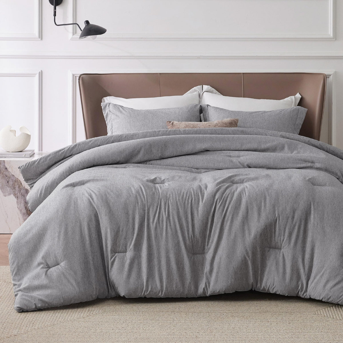 Bedsure grey queen comforter set folded, highlighting ultra-soft texture.